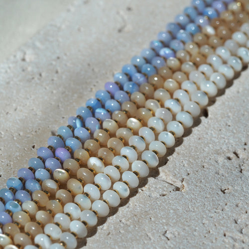 Iridescent glass beads close-up, Dreamtide Collection handmade jewelry British Columbia Canada