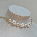 The Urban Petal white flower choker necklace on bust display, handcrafted in BC Canada