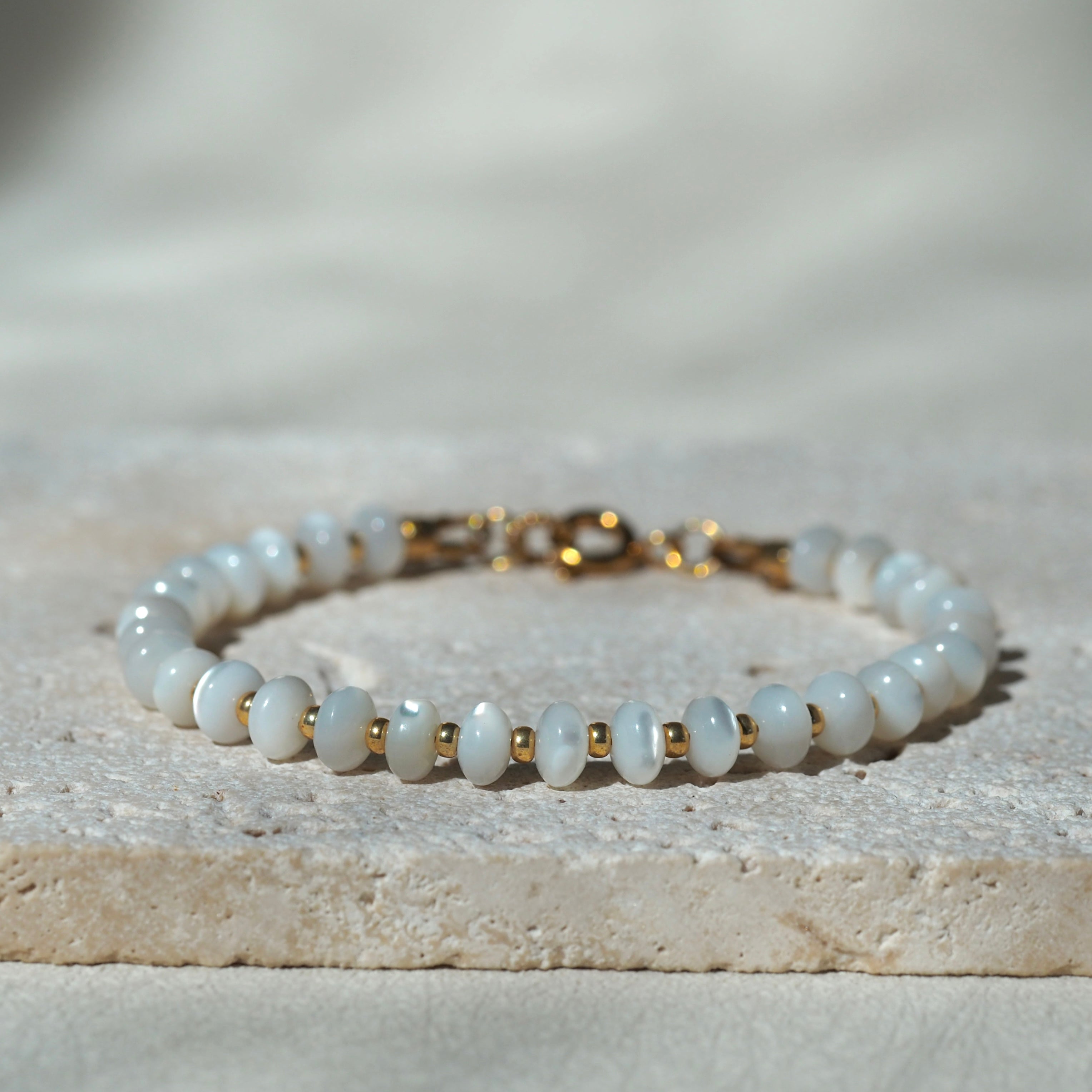 Dreamtide Shore handcrafted white iridescent glass bead bracelet, made in BC Canada