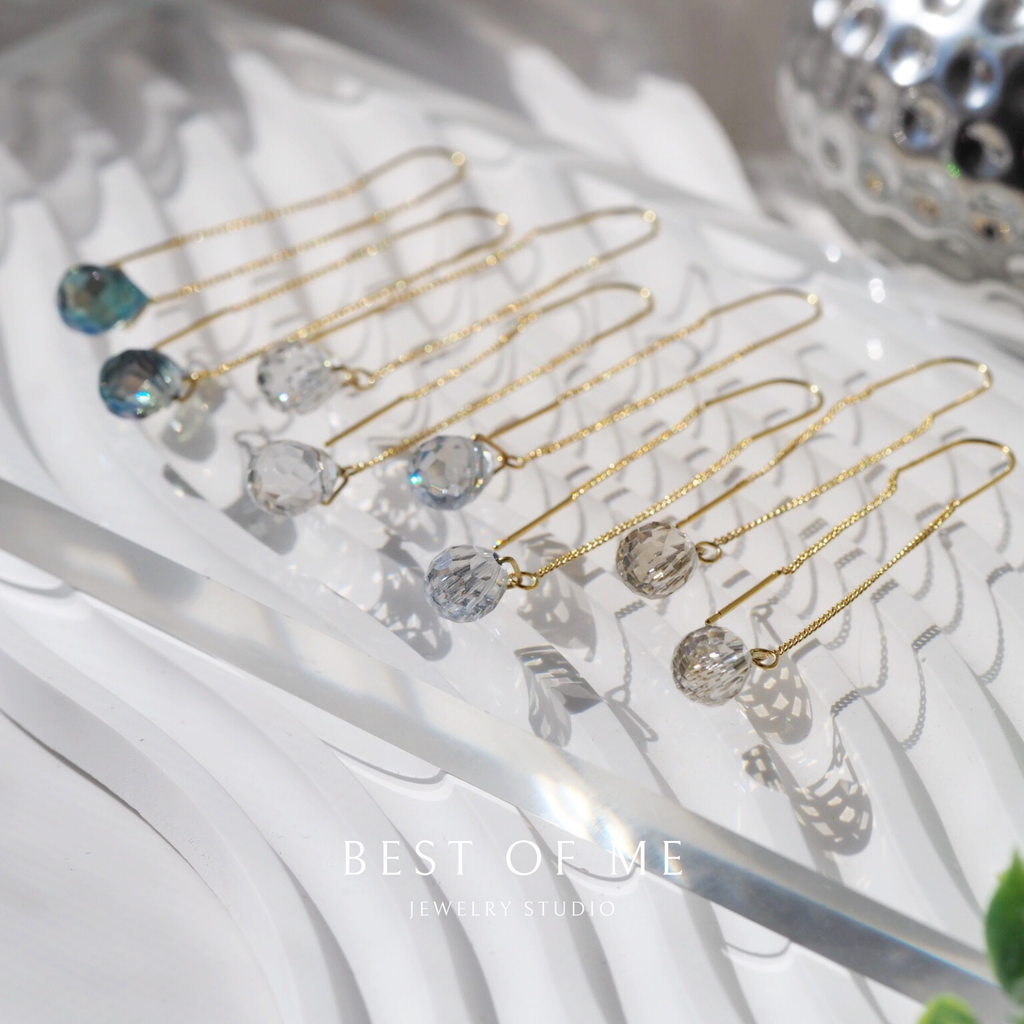 Delicate drop beads with gold ear thread  on a white surface, with 'BEST OF ME' branding.