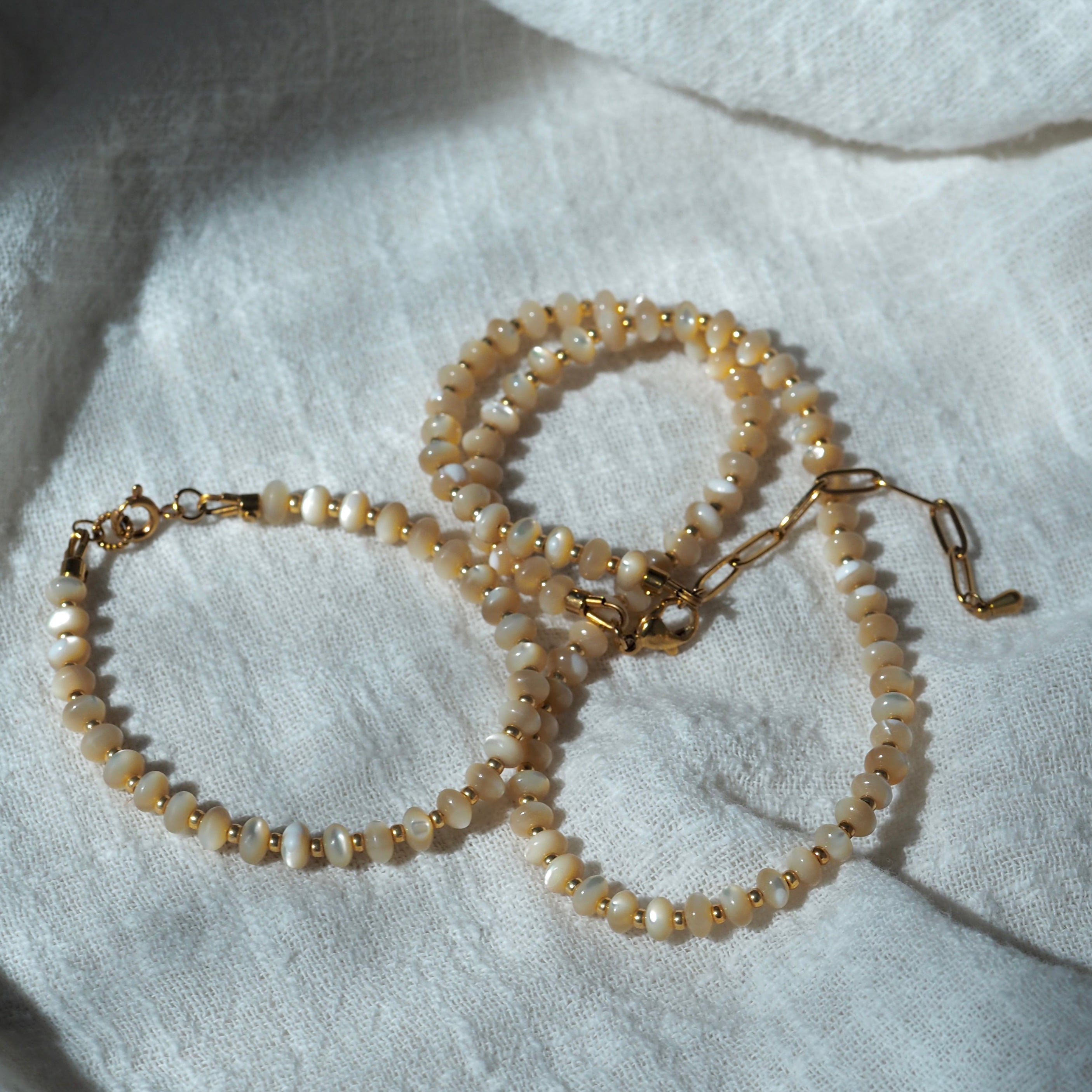 Dreamtide Dune beige glass bead choker necklace styling, handcrafted minimalist jewelry BC Canada