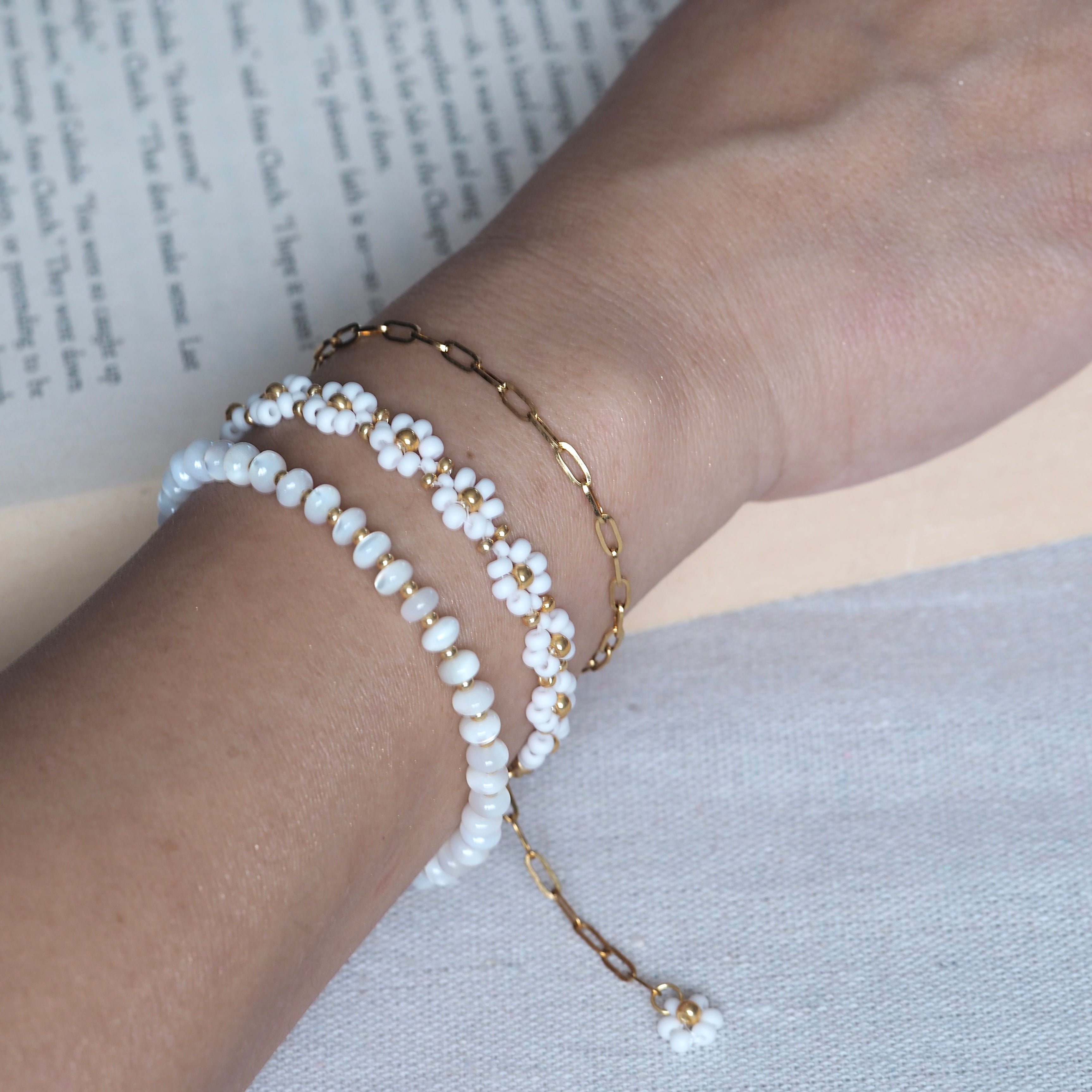 Dreamtide bracelet stack on wrist, minimalist glass bead jewelry handmade in British Columbia